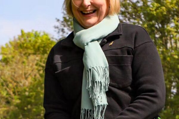 Alison Hume MP for scarborough and whitby planting a tree at st helens in the park caravan and campsite