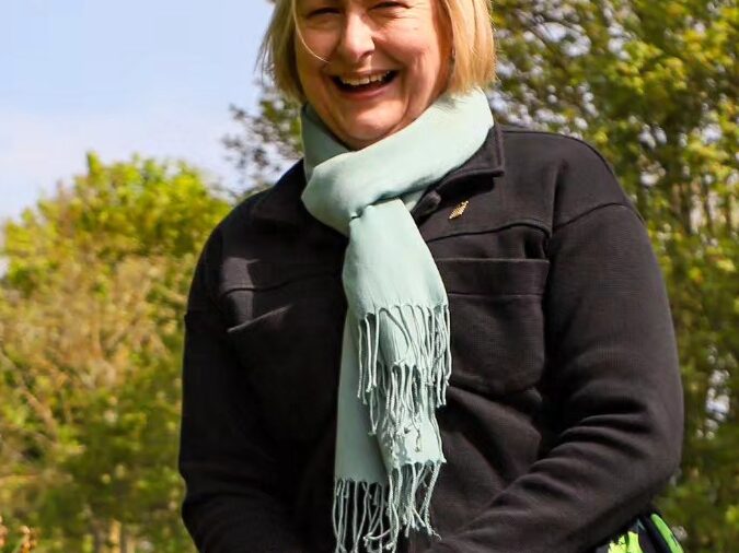 Alison Hume MP for scarborough and whitby planting a tree at st helens in the park caravan and campsite